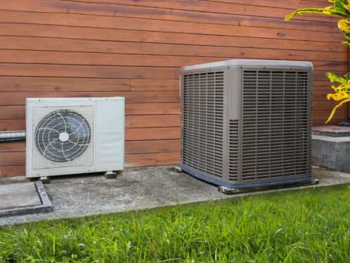 Air conditioning and heat pump units outside a Cape Coral home